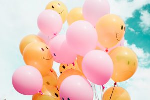 balloons with smiley faces